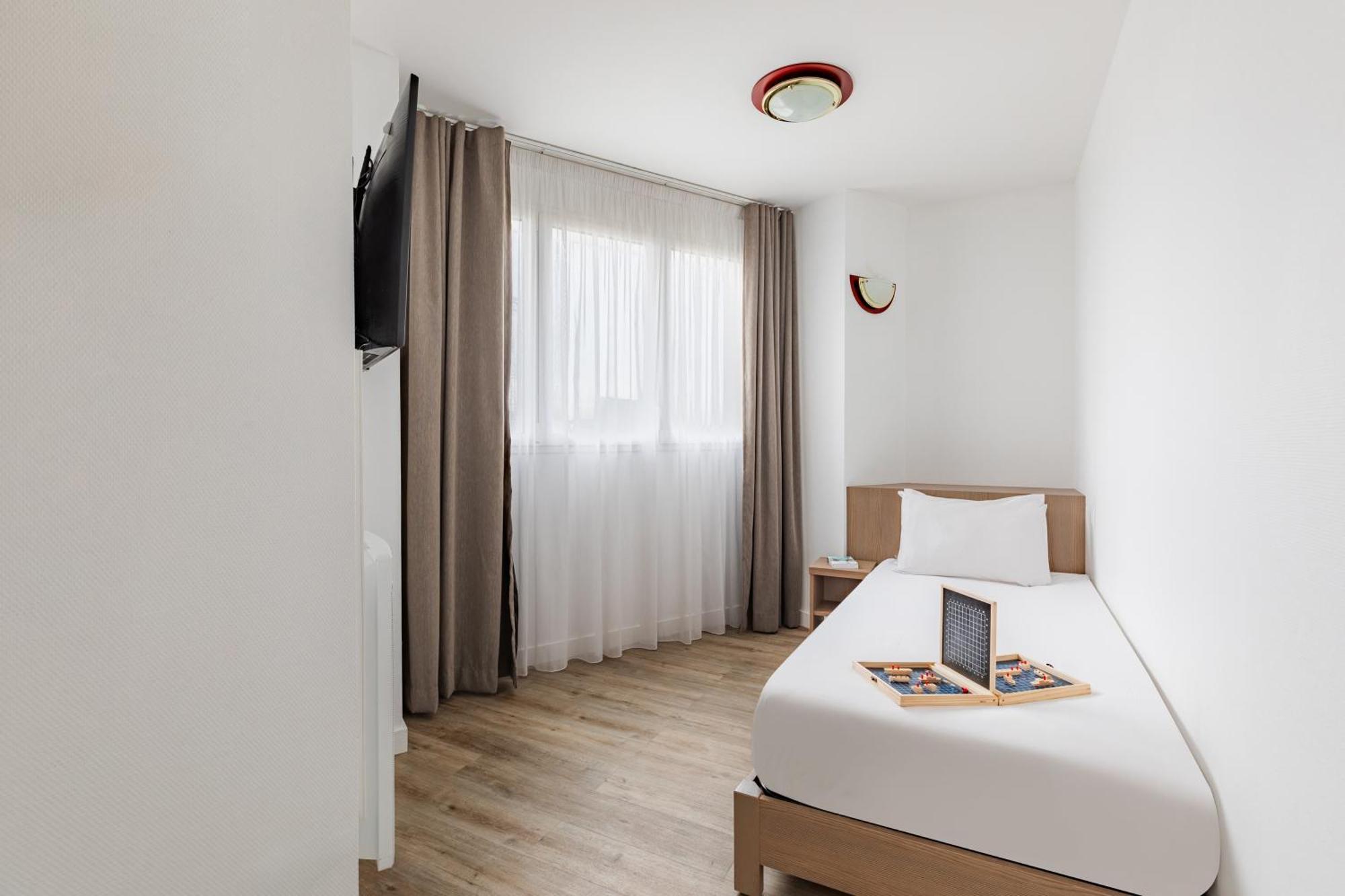 อัปปาร์ตซิตี้ เลอ ม็อง ซองทร์ Aparthotel เลอม็องส์ ภายนอก รูปภาพ