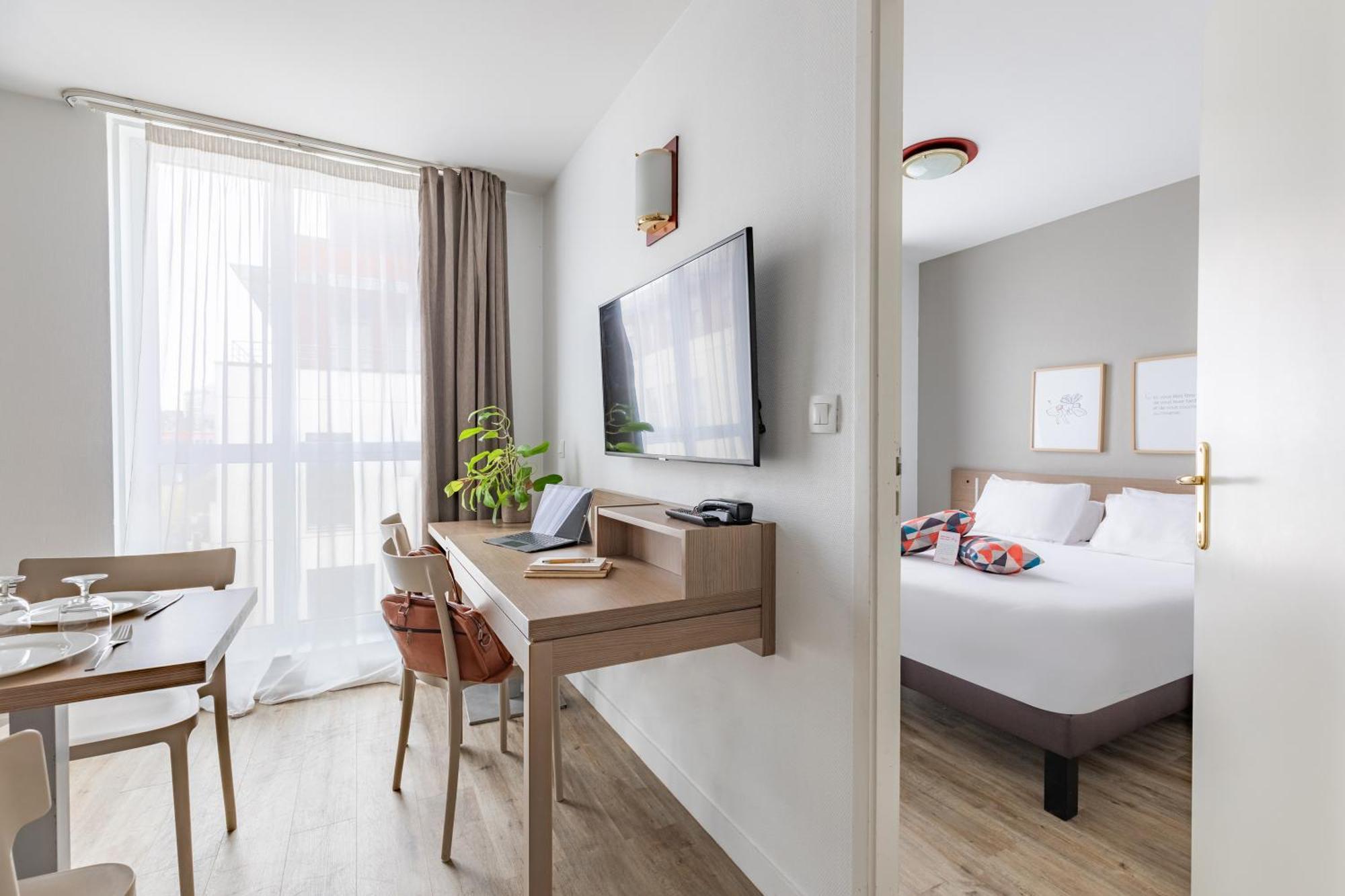 อัปปาร์ตซิตี้ เลอ ม็อง ซองทร์ Aparthotel เลอม็องส์ ภายนอก รูปภาพ