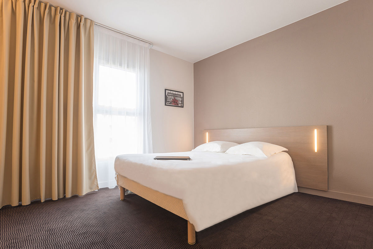 อัปปาร์ตซิตี้ เลอ ม็อง ซองทร์ Aparthotel เลอม็องส์ ภายนอก รูปภาพ