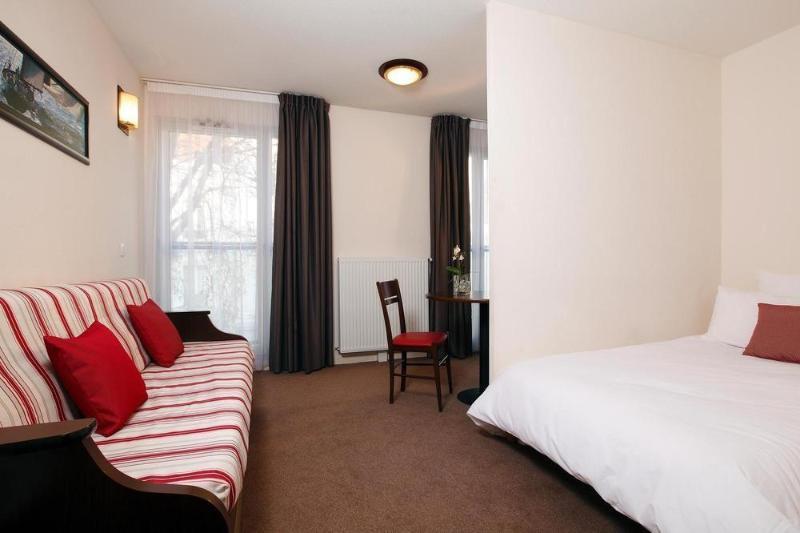 อัปปาร์ตซิตี้ เลอ ม็อง ซองทร์ Aparthotel เลอม็องส์ ภายนอก รูปภาพ