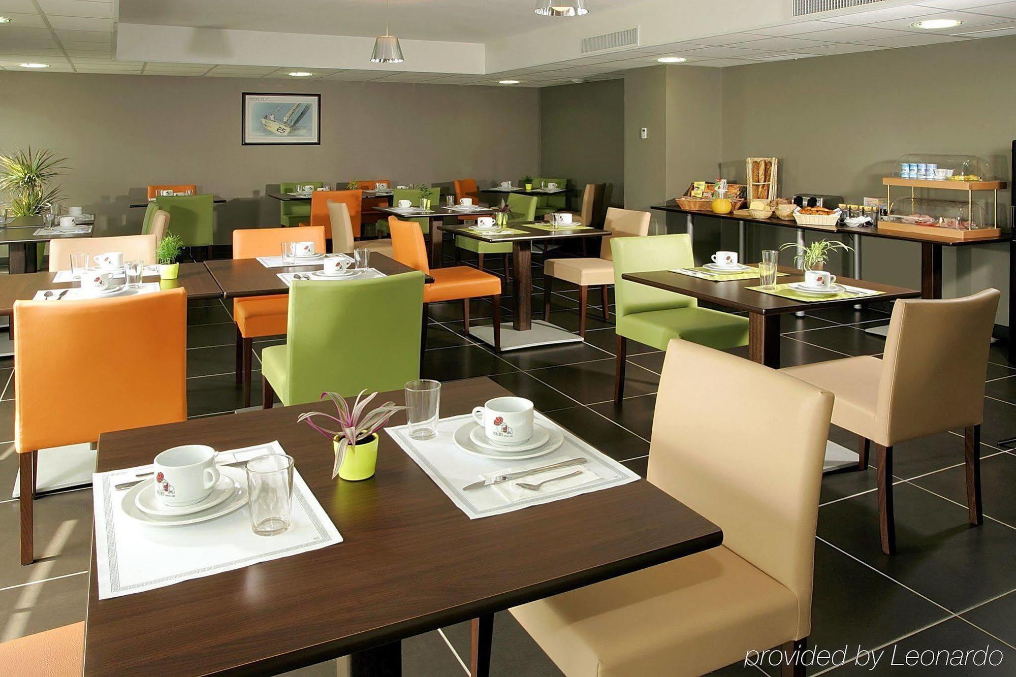 อัปปาร์ตซิตี้ เลอ ม็อง ซองทร์ Aparthotel เลอม็องส์ ร้านอาหาร รูปภาพ