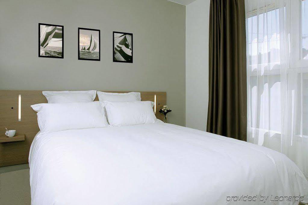 อัปปาร์ตซิตี้ เลอ ม็อง ซองทร์ Aparthotel เลอม็องส์ ภายนอก รูปภาพ