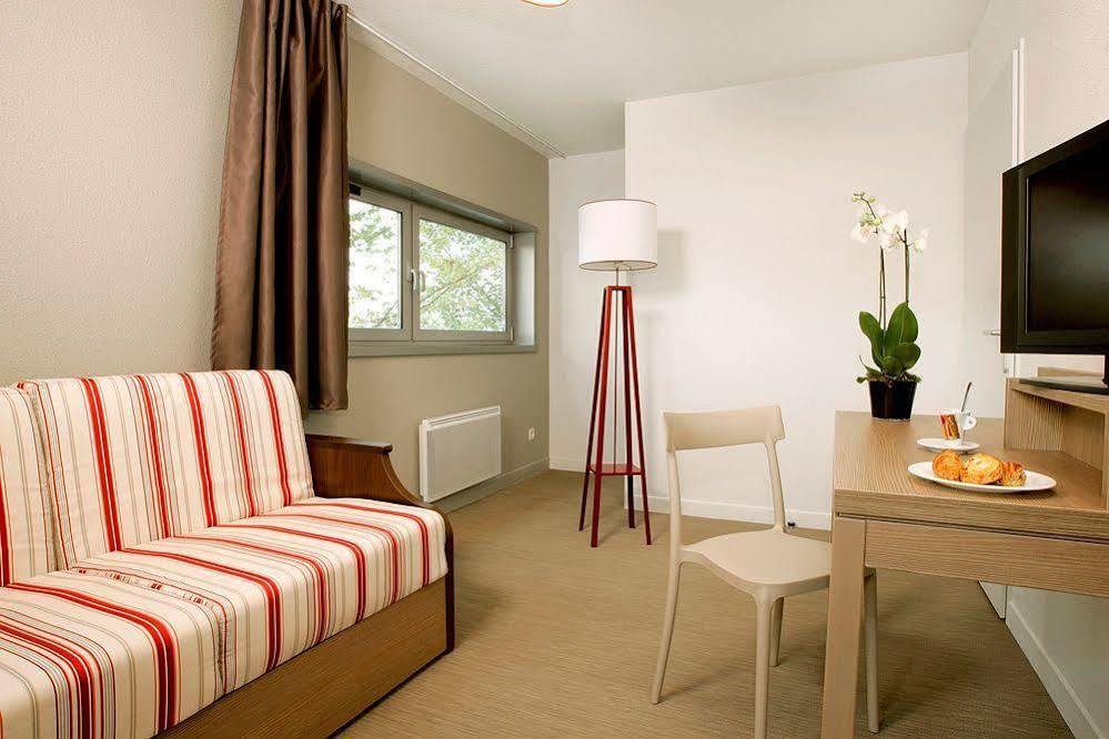 อัปปาร์ตซิตี้ เลอ ม็อง ซองทร์ Aparthotel เลอม็องส์ ภายนอก รูปภาพ