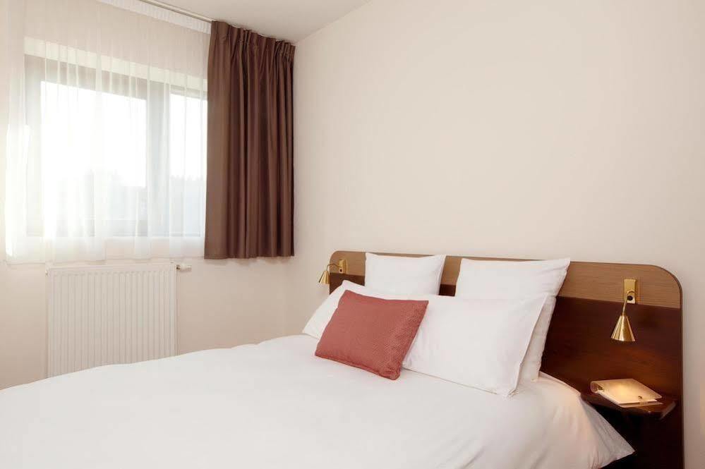 อัปปาร์ตซิตี้ เลอ ม็อง ซองทร์ Aparthotel เลอม็องส์ ภายนอก รูปภาพ