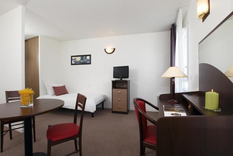 อัปปาร์ตซิตี้ เลอ ม็อง ซองทร์ Aparthotel เลอม็องส์ ภายนอก รูปภาพ