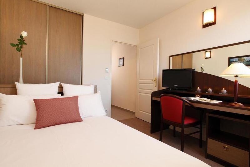 อัปปาร์ตซิตี้ เลอ ม็อง ซองทร์ Aparthotel เลอม็องส์ ภายนอก รูปภาพ