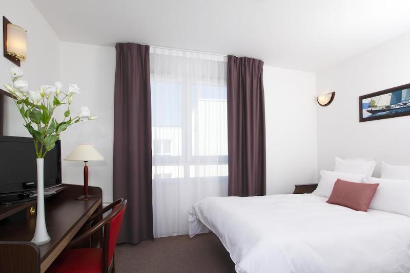 อัปปาร์ตซิตี้ เลอ ม็อง ซองทร์ Aparthotel เลอม็องส์ ภายนอก รูปภาพ