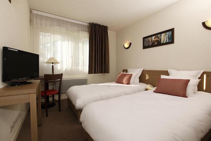 อัปปาร์ตซิตี้ เลอ ม็อง ซองทร์ Aparthotel เลอม็องส์ ภายนอก รูปภาพ